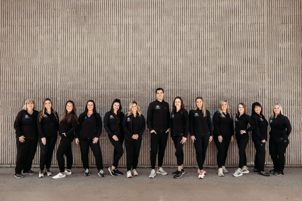 Dental team lineup representing friendly dental care at Twin Oaks Dental Studio in Valley Park MO